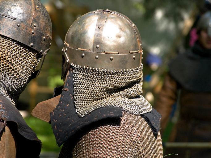 Image of two people in chainmail.
